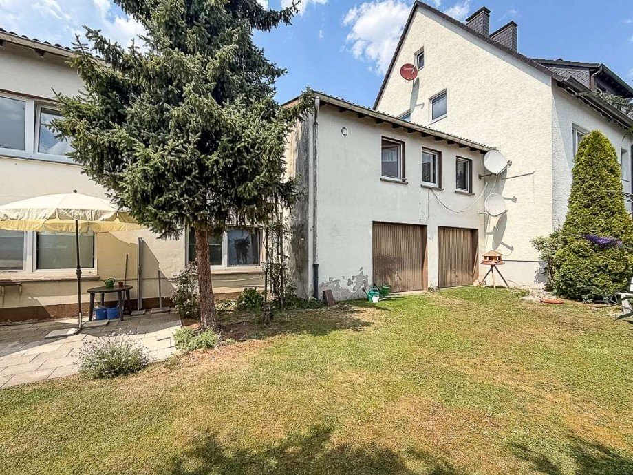 Anbau mit Garagen Mehrfamilienhaus Hagen