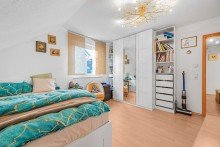 Das Schlafzimmer Maisonette-Eigentumswohnung mit gro�em Balkon, eigenem Garten und Stellplatz in Witten, am Schnee!