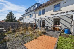 Hauptbild Attraktive Erdgeschosswohnung mit zwei Terrassen und gro�er Doppelgarage in Wetter-Grundsch�ttel!